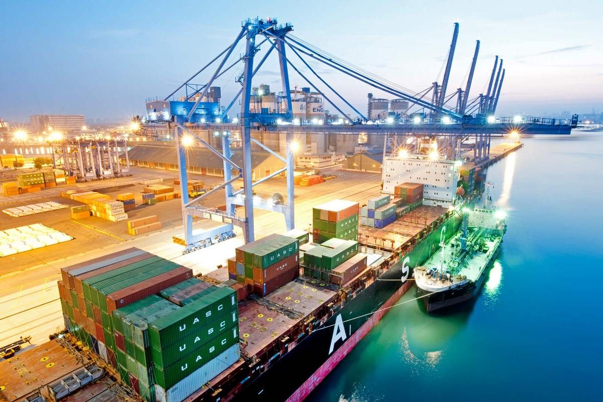 Container ship being loaded at port